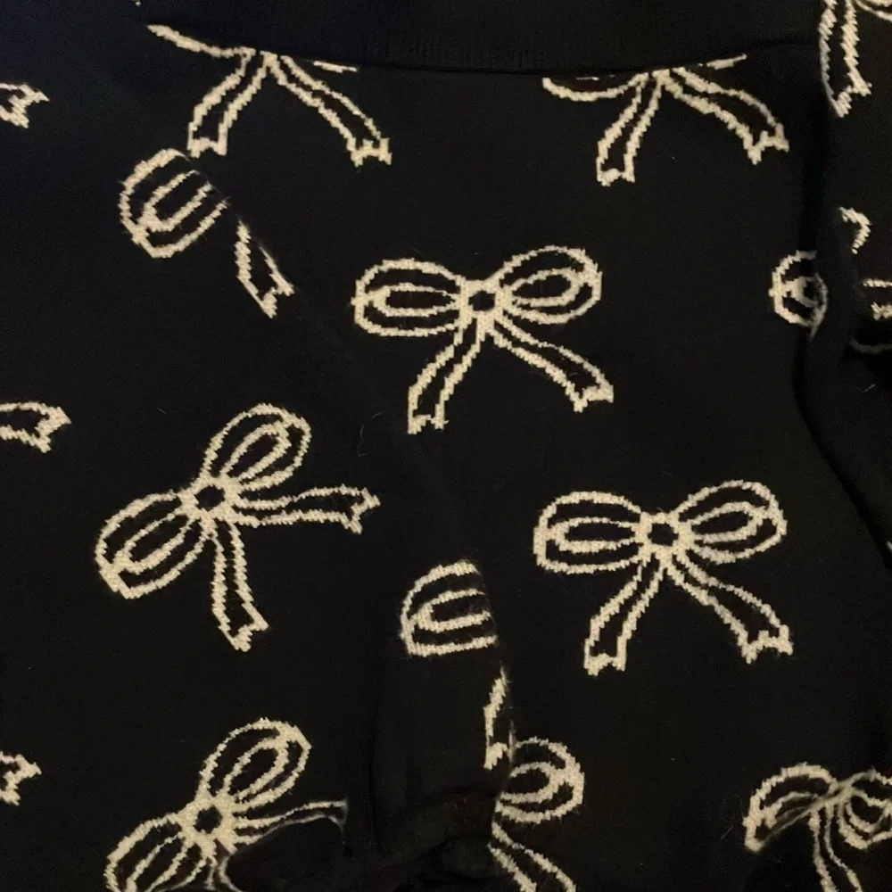 Black Sweater with White Bow Pattern - Picture 3 of 3